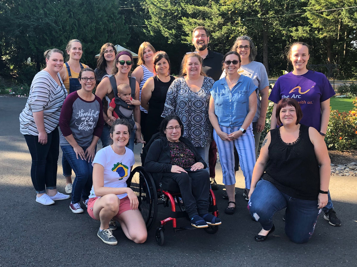 The Arc Oregon staff members posting for group photo at their 2019 retreat