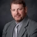 Head shot photo of Daivd Proffitt in suit and tie